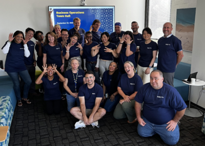 Terence Phuong and the Business Operations department at a team meeting